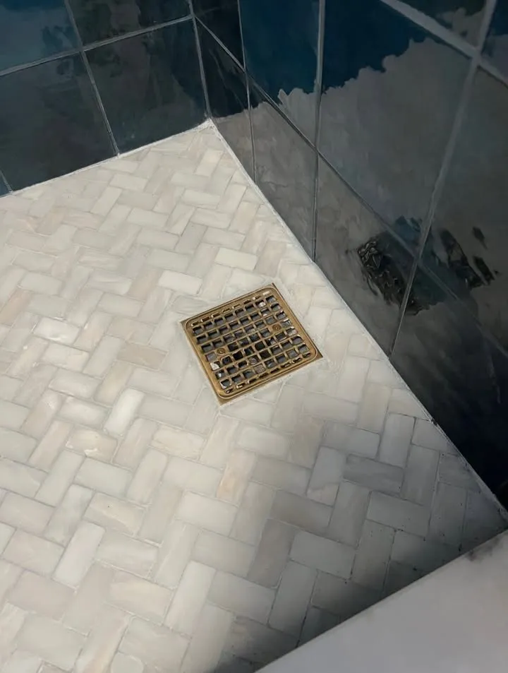 Marble mosaic shower floor detail